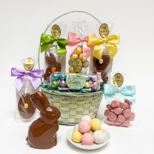 Easter gift basket with pink ribbon and colorful Easter eggs on a white background. Made in Beverly Hills and Los Angeles. Gourmet Chocolates.